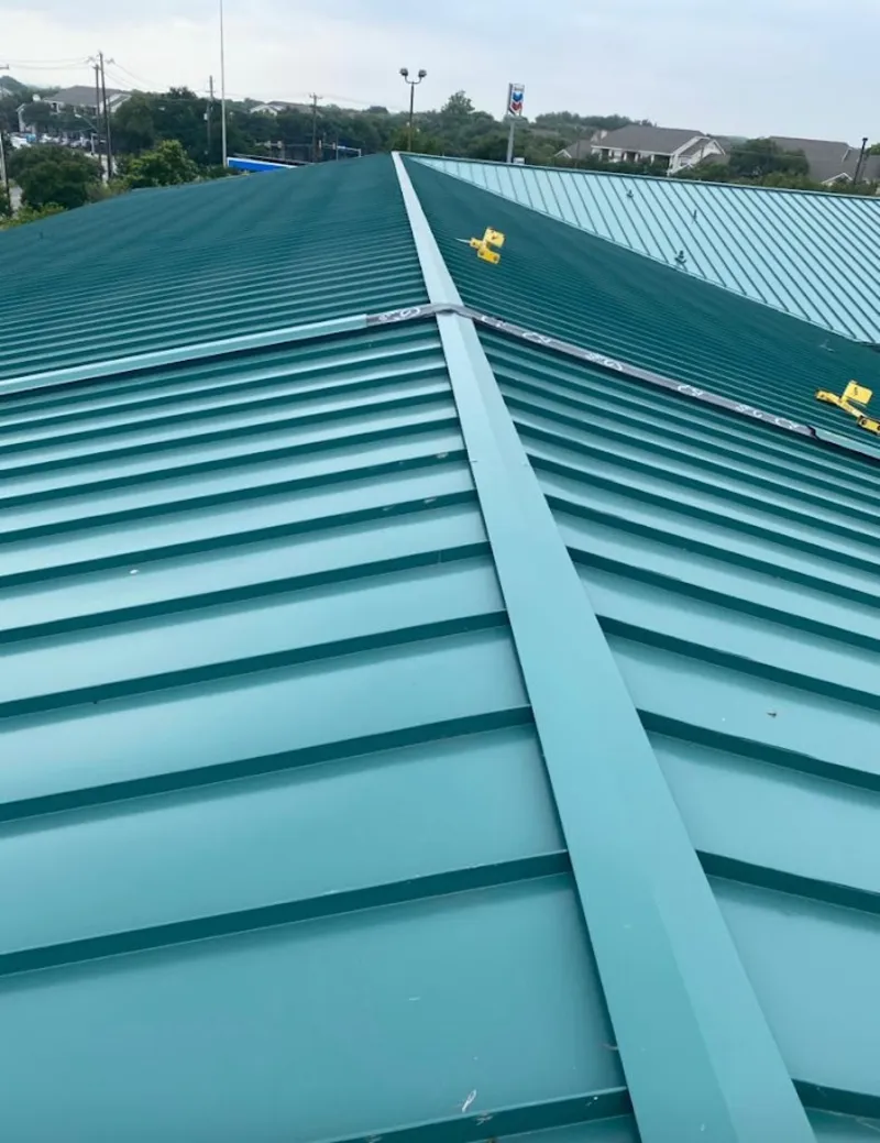 Green commercial metal roof ridge and valley for Metal Roof Repair in Leicester
